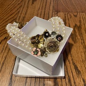 Costume Jewelry Triple “Pearl” strand necklace with burnt gold floral detail